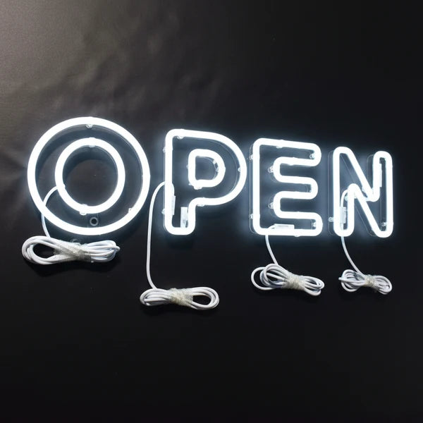 Custom illuminated OPEN neon signage for cafes, restaurants, and commercial storefronts.