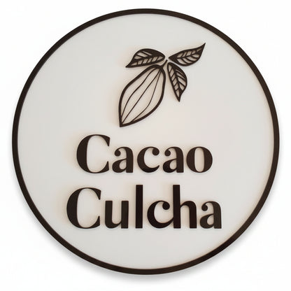 Custom café and chocolate brand sign with circular design and raised black logo details