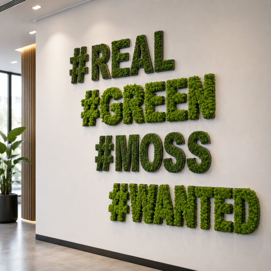 Custom 3D moss letter wall sign featuring preserved green moss typography mounted on a modern office wall.
