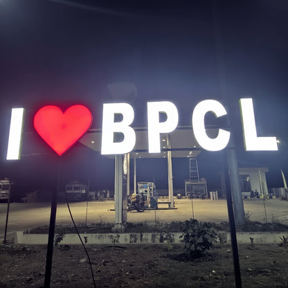 Personalized outdoor LED monument sign featuring glowing city branding and heart icon