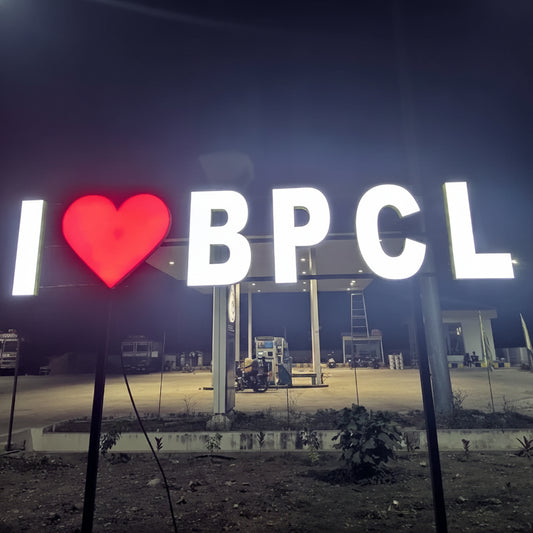Personalized outdoor LED monument sign featuring glowing city branding and heart icon