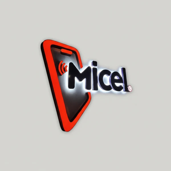 Illuminated acrylic business logo sign with modern backlit lettering for reception wall.