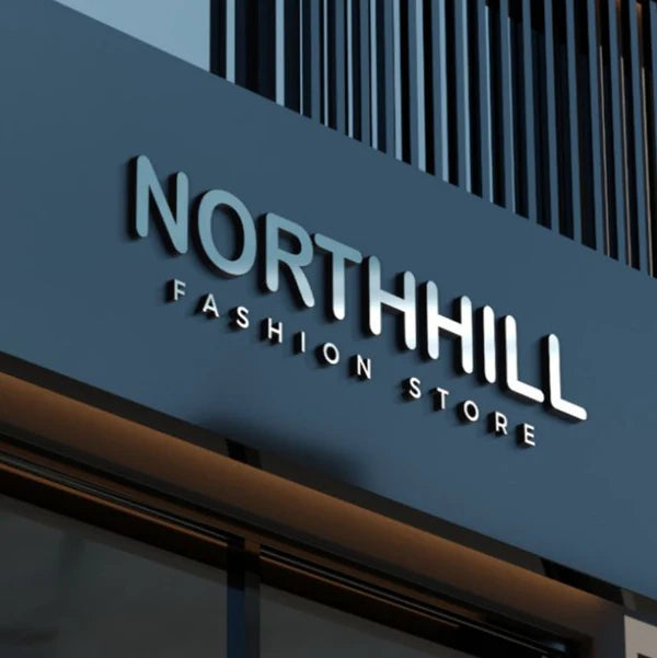 Modern illuminated fashion retail shop logo sign with premium LED neon lettering.