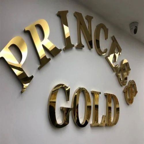 Custom mirror gold stainless steel 3D letter sign mounted on a premium office wall for luxury business branding.