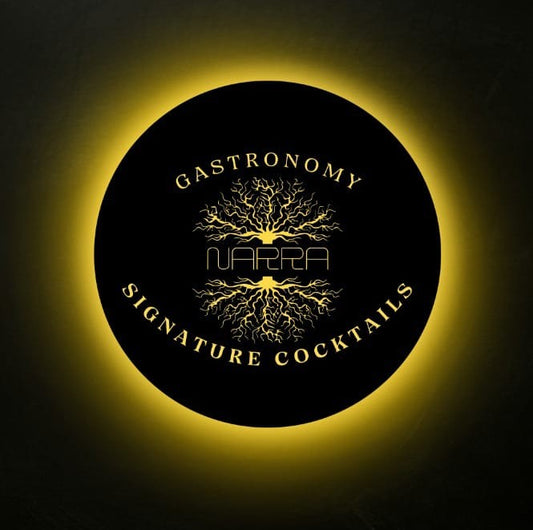 Custom round LED acrylic restaurant sign with warm halo backlighting, ideal for bars, lounges, restaurants, and hospitality branding.