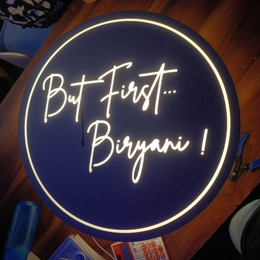 Custom round LED neon sign with illuminated typography and circular border, ideal for restaurants, cafés, and food businesses.
