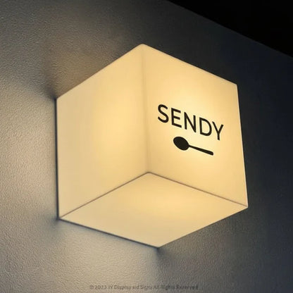 Modern wall-mounted cube LED sign for restaurants, cafés, and retail storefronts.