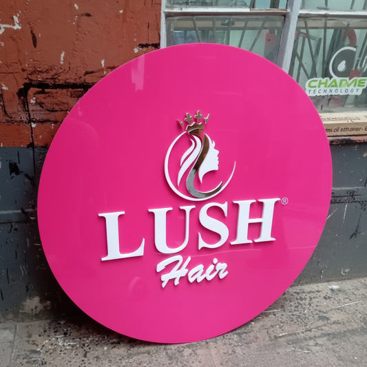 Custom beauty salon branding display featuring circular logo board with premium finish