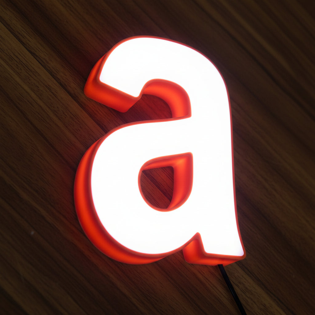 Modern illuminated lowercase letter A wall art featuring a bold minimalist typography design with a glowing effect.