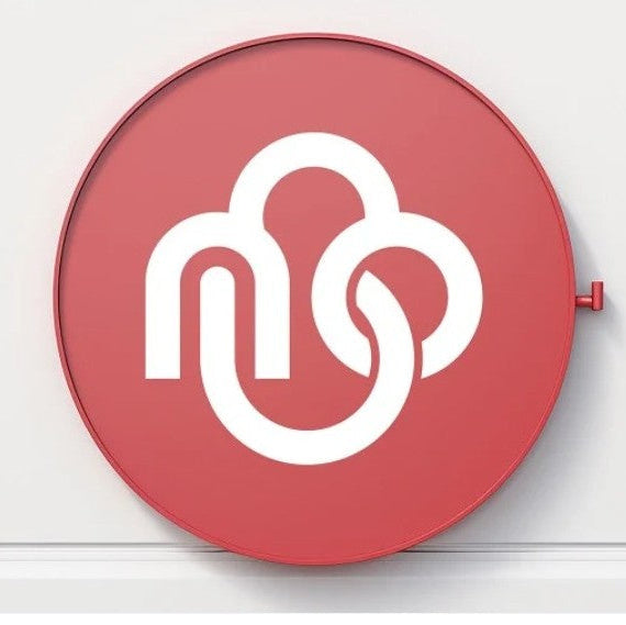 Modern round wall-mounted business logo sign designed for retail storefront visibility