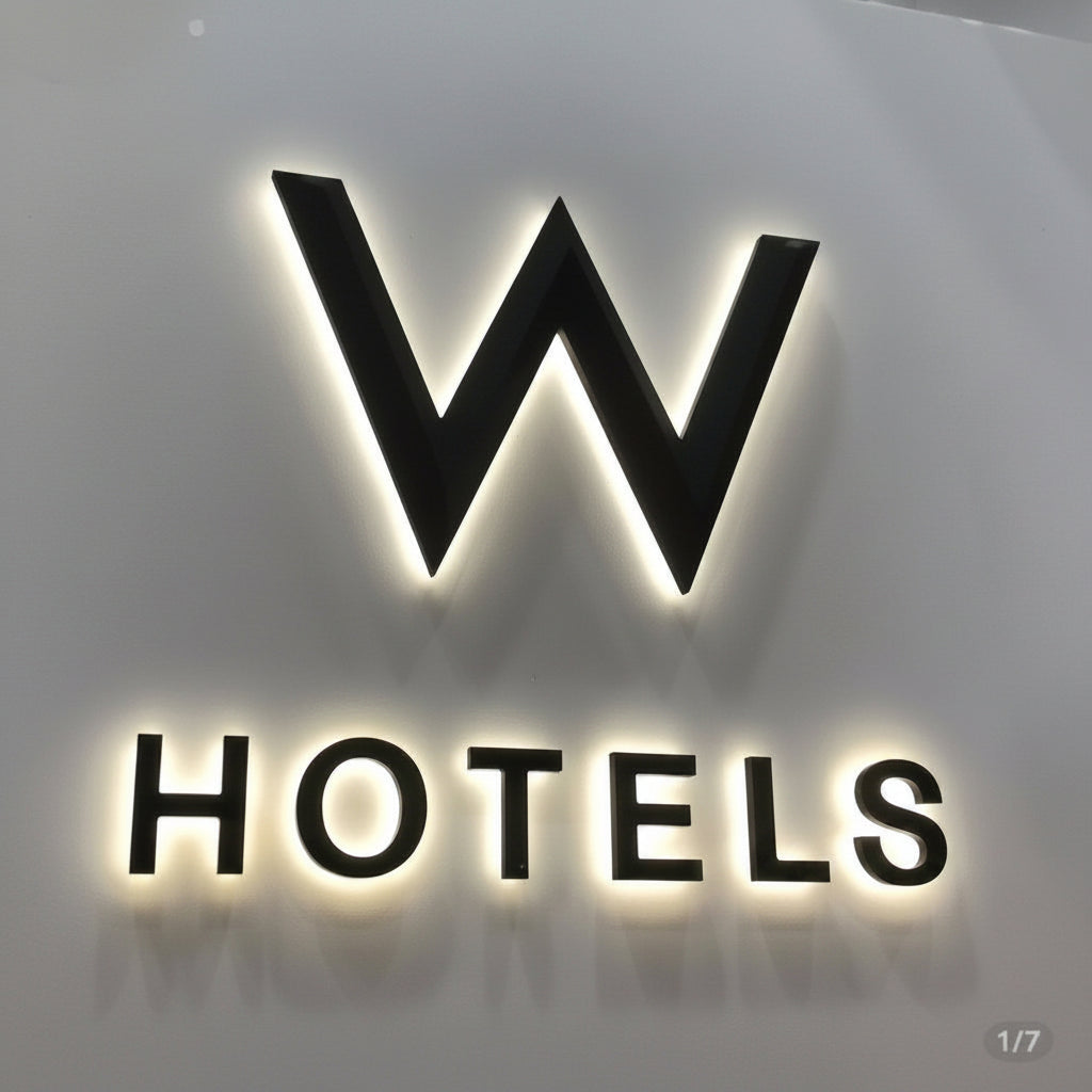 Premium custom halo-lit hotel logo sign with LED backlit 3D letters mounted on an interior wall, ideal for hotels, offices, and luxury commercial branding.